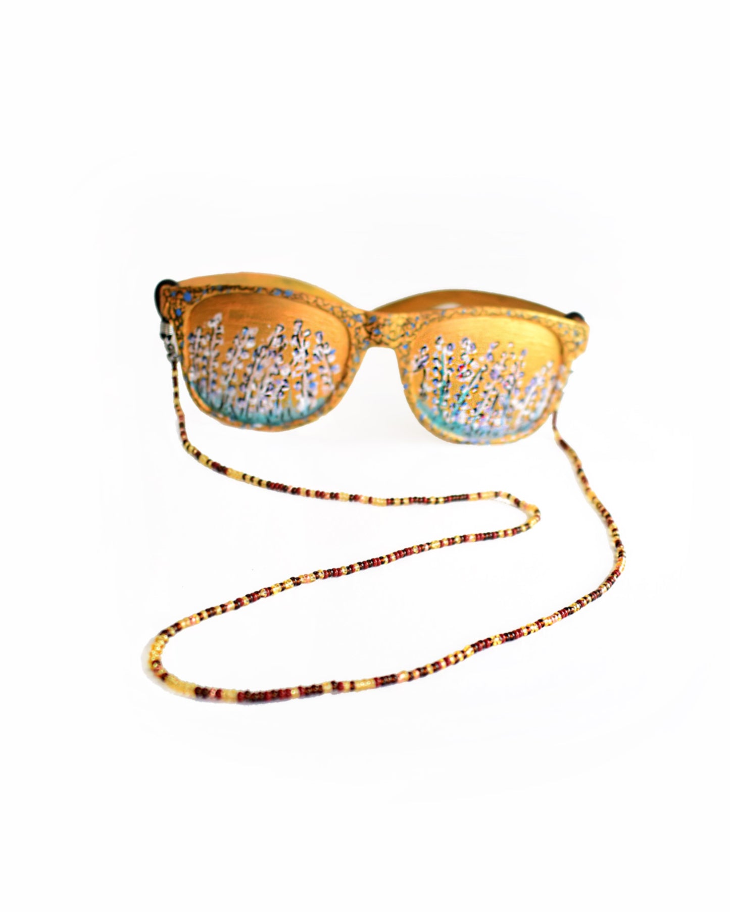 Acessórios de moda online - Loja de bijuterias Talai - Corrente de óculos de missangas multicoloridas, com destaque para o dourado transparente. Uma combinação de cores muito bonita para usar no verão. Veja mais na nossa loja online e compre bijuteria a condizer.