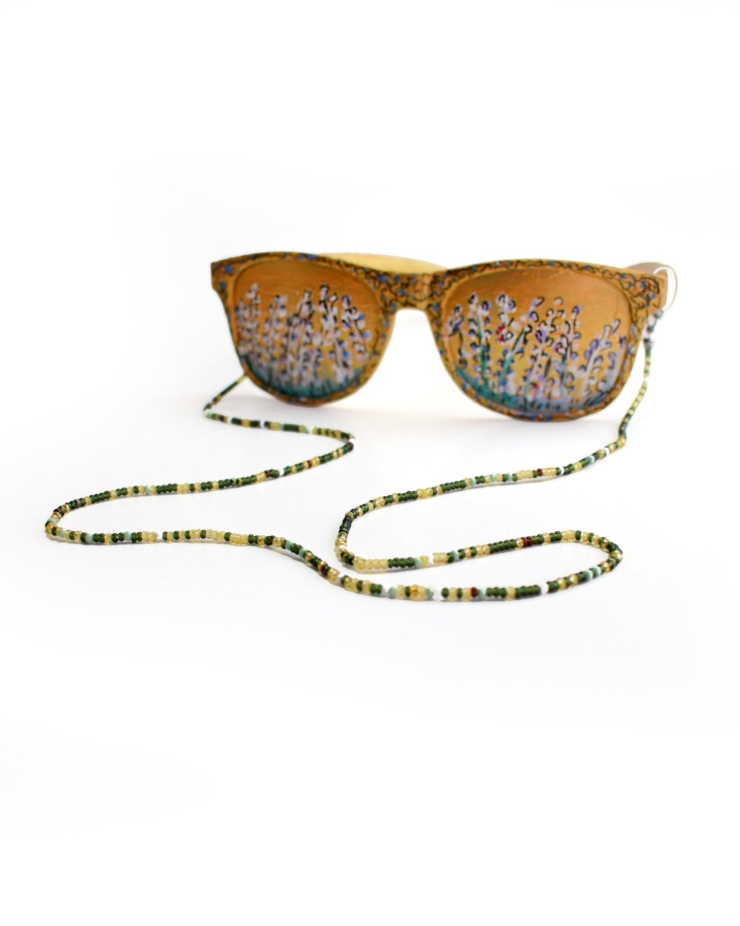 Acessórios de moda online - Loja de bijuterias Talai - Corrente de óculos de missangas multicoloridas, com destaque para o verde. Uma combinação de cores muito bonita para usar em qualquer altura do ano. Veja mais na nossa loja online e compre bijuteria a condizer.